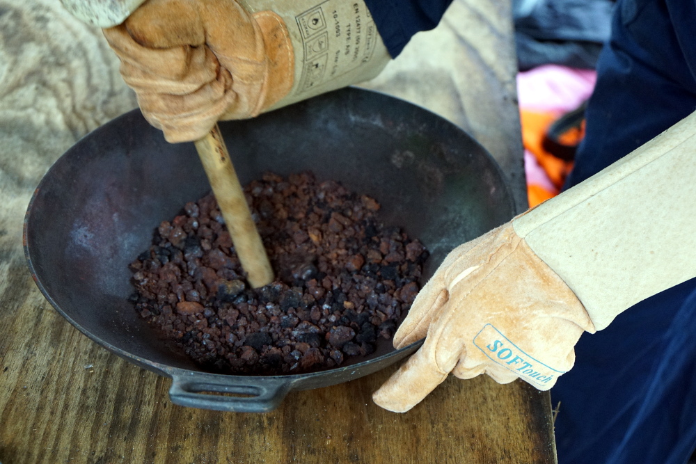Crushing the ore. Photo: © Martina Short, used here with permission.