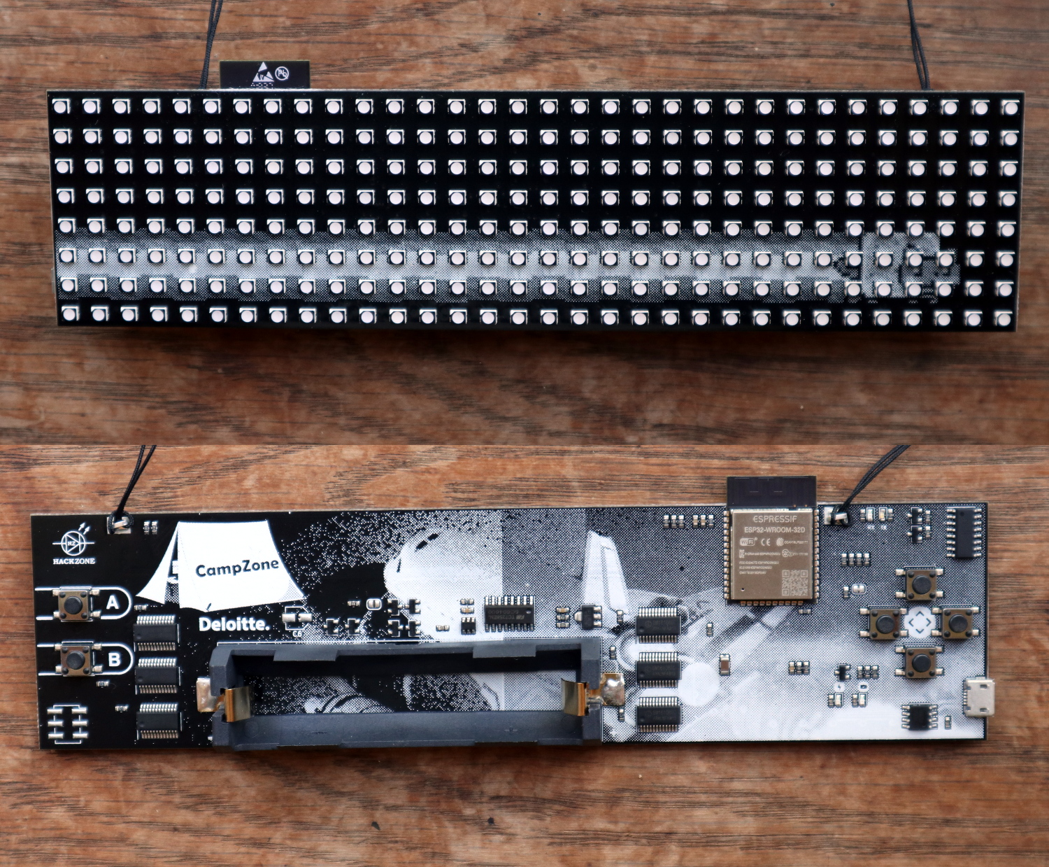 The CampZone 2019 badge, front(top) and rear.