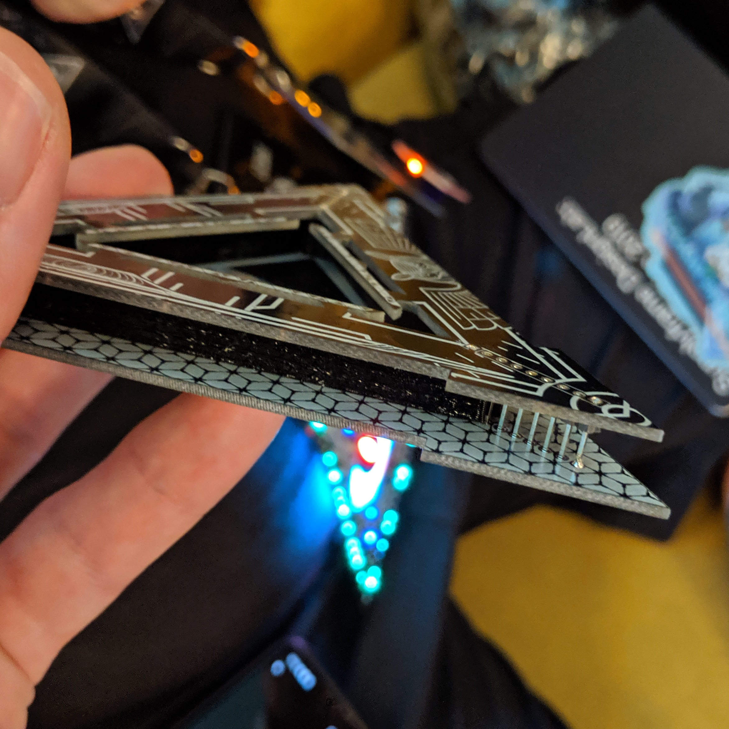 Illuminati badge at DC27 - board separation