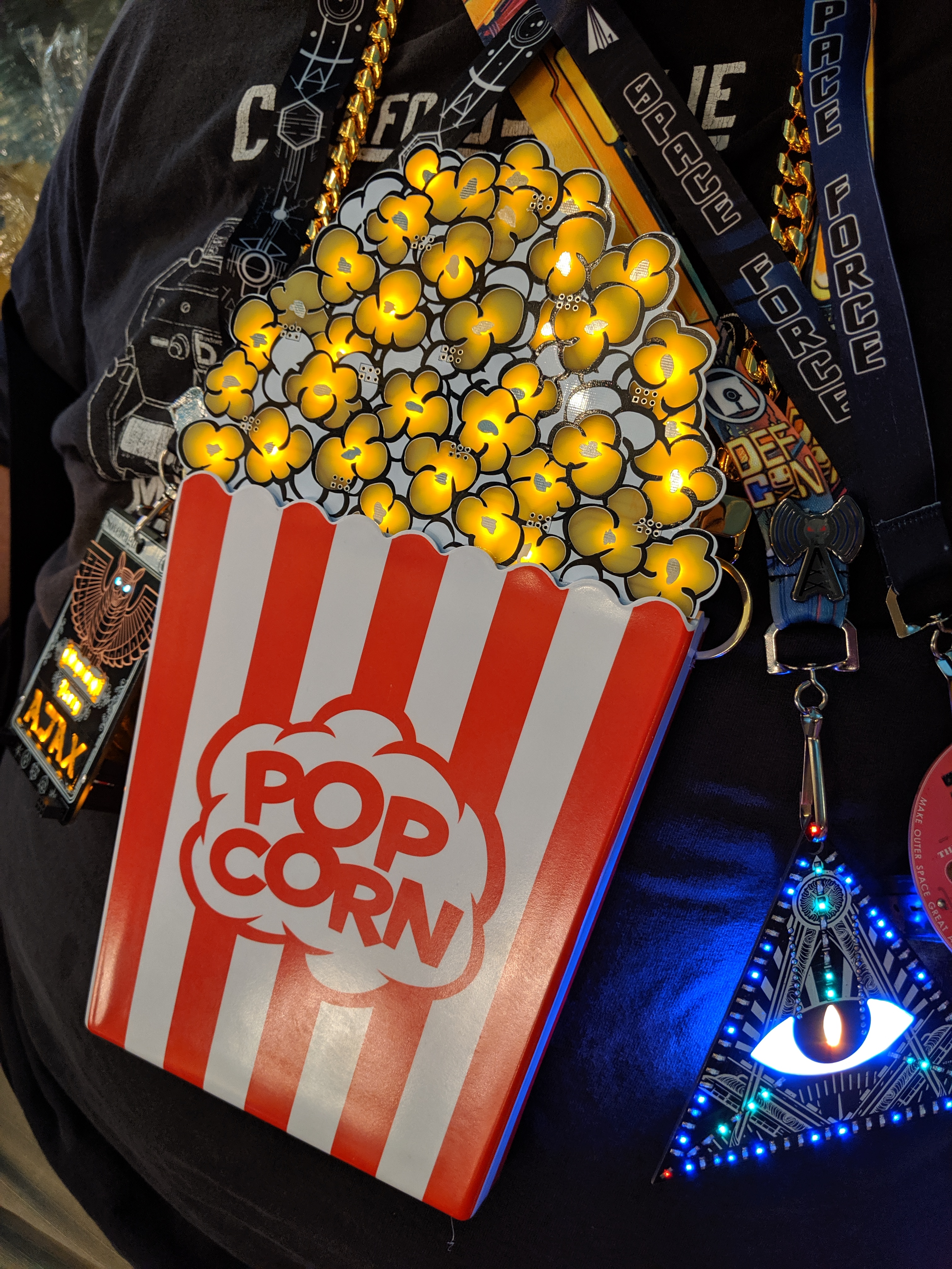 Popcorn badge DC27 front