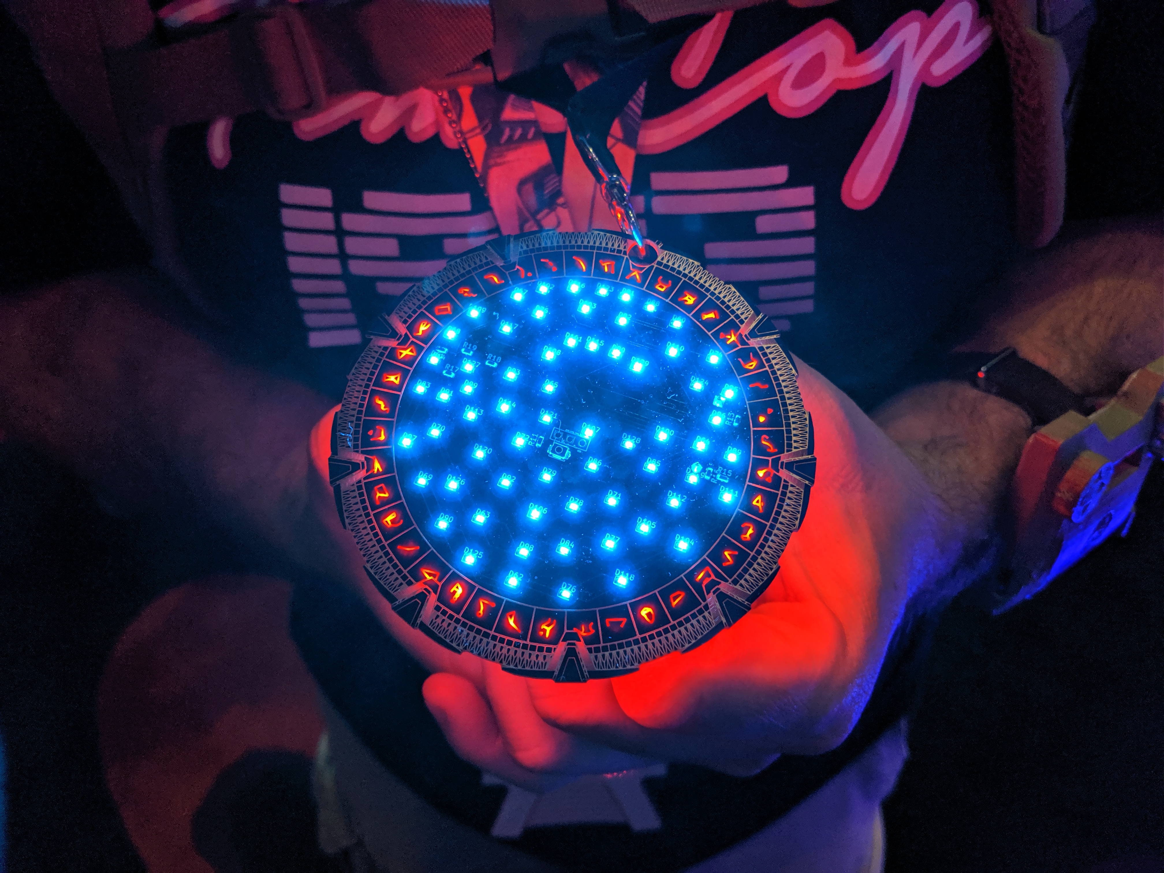 Stargate badge at DC27 - illuminated