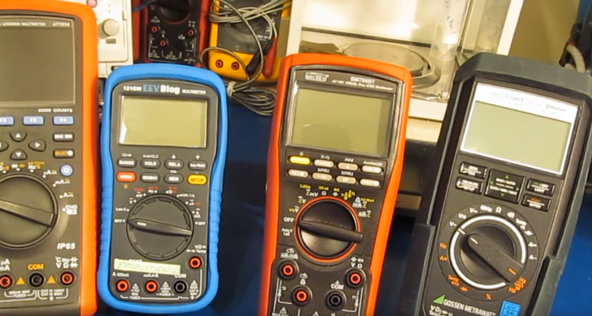 The Brymen BM788BT shown along side other digital multimeters.