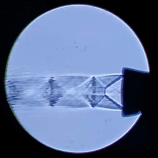 Shock diamonds from a homemade rocket nozzle imaged by this setup.