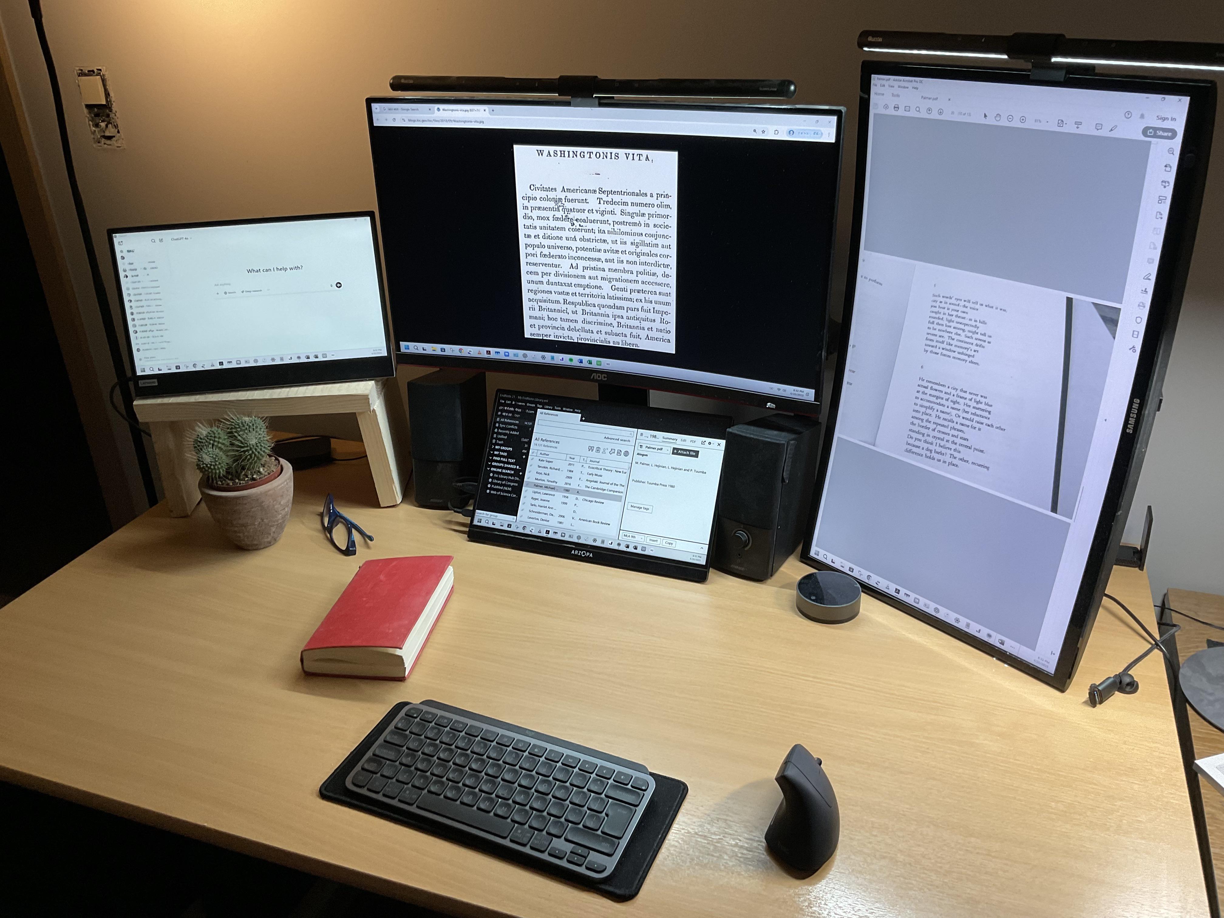 A quiet, focused research battlestation with only four screens.