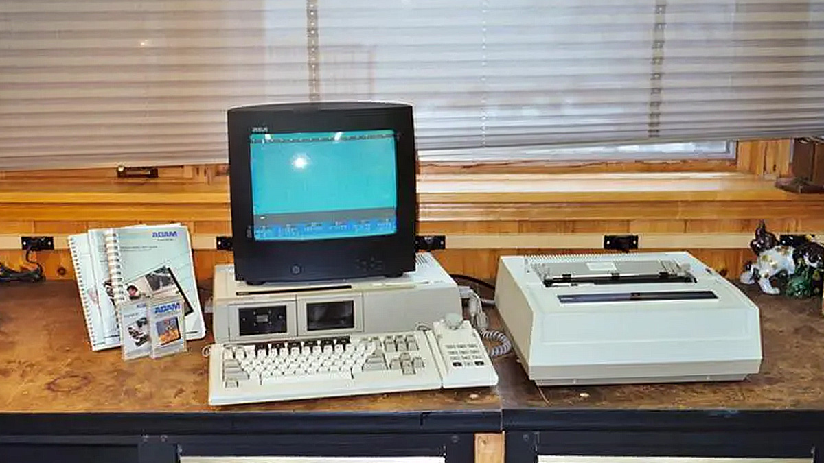 a Coleco Adams console on a desk