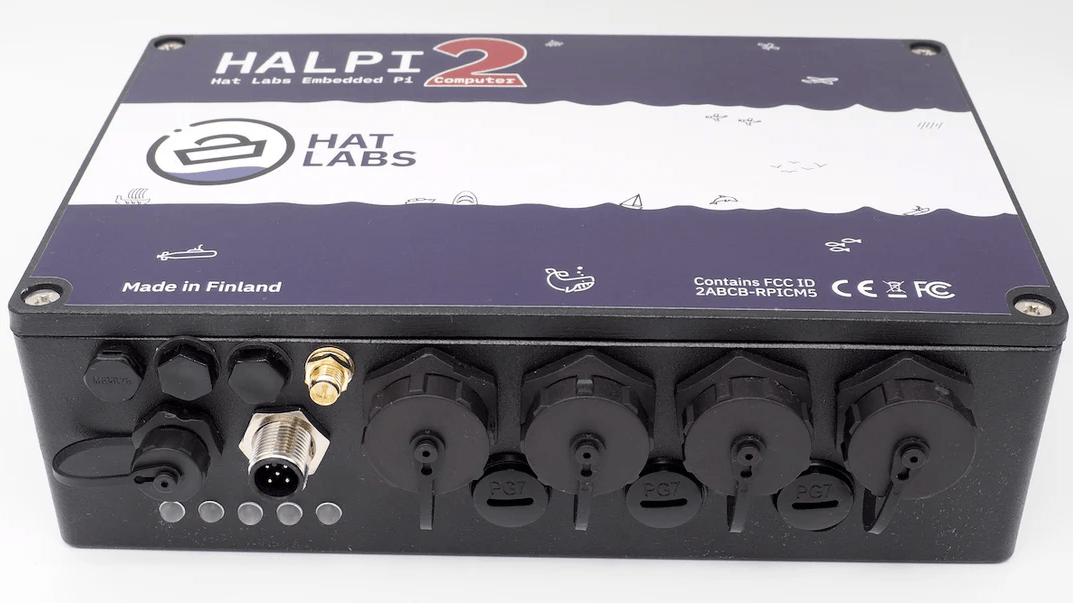 A black, rectangular box is shown, with a number of waterproof screw connectors on the front.