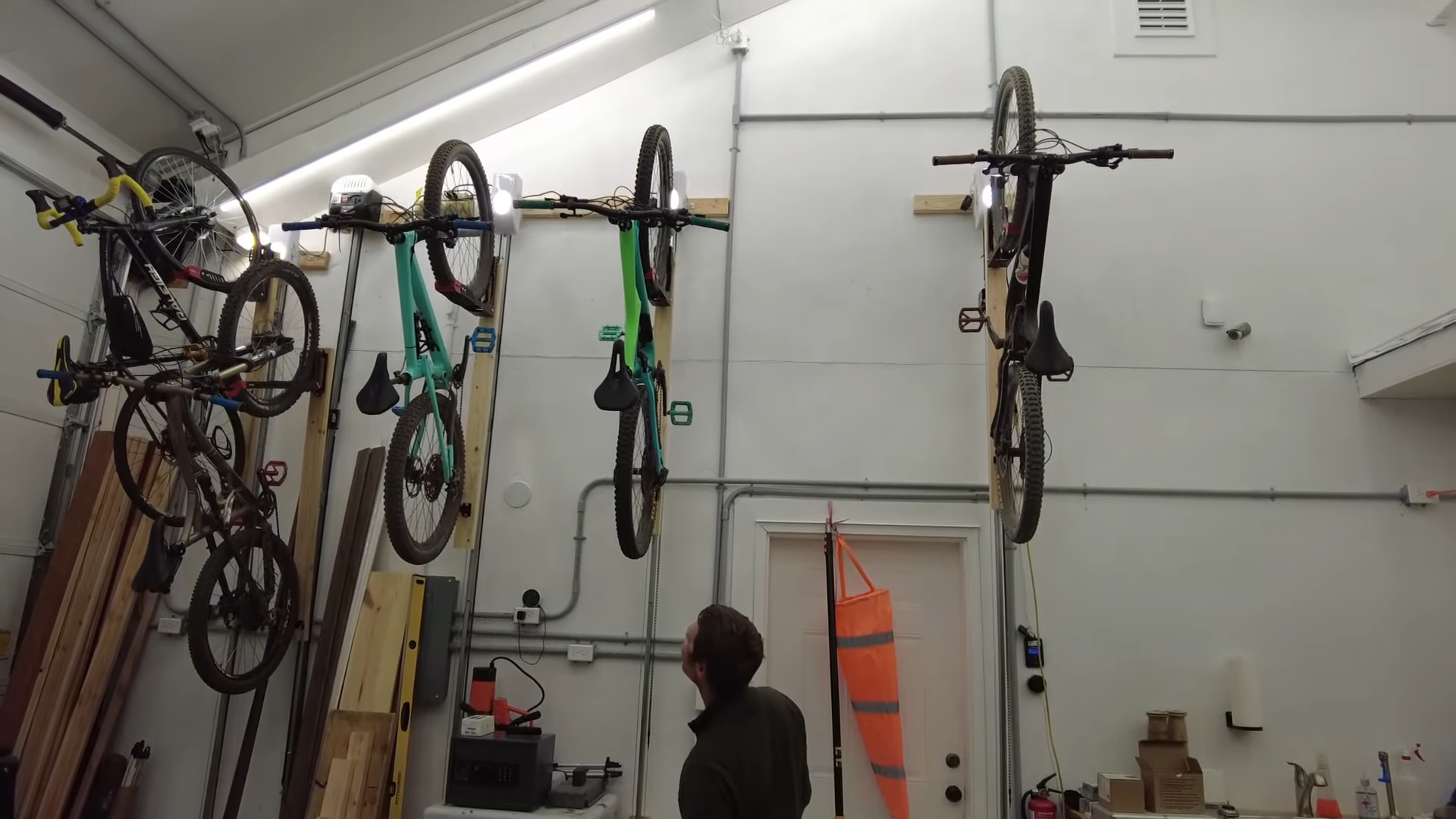 bikes are shown raised from the floor from the garage opener lift