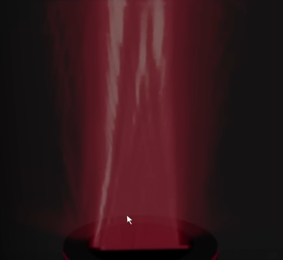 A roughly rectangular red pattern is shown, with brighter streaks converging toward the center. 