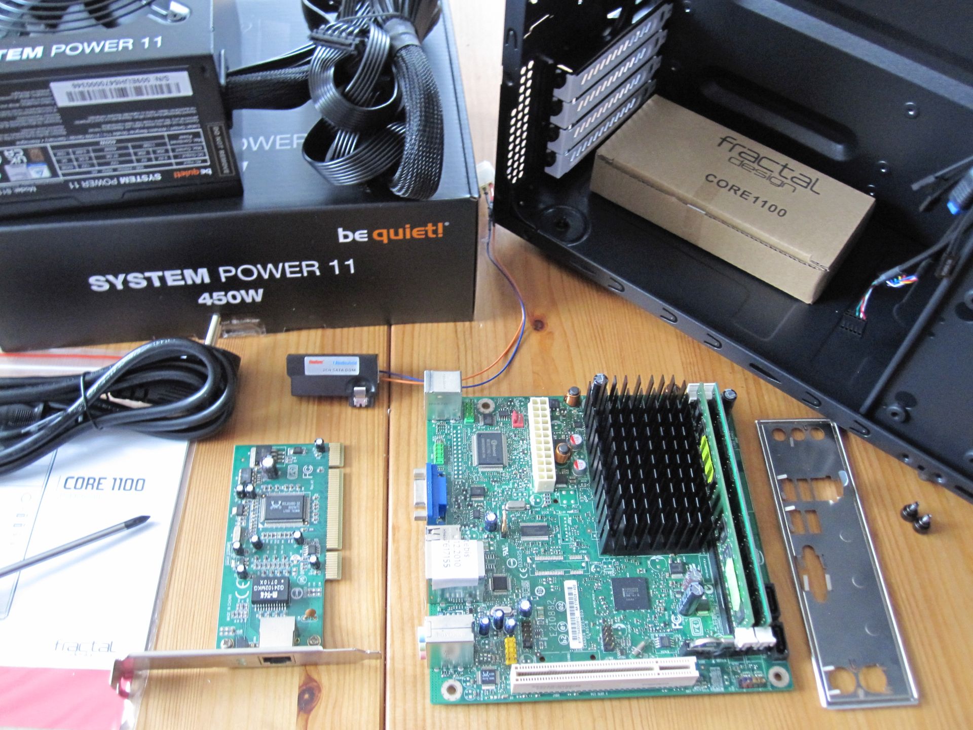 With the powers of e-waste and non-sketchy PSUs combined... a DIY router. (Credit: Maya Posch)